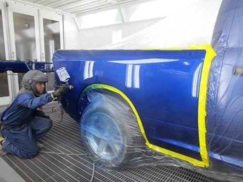 painting a truck blue at Bates Collision